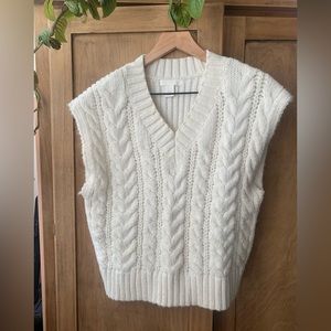 Oversized cable-knit sweater vest